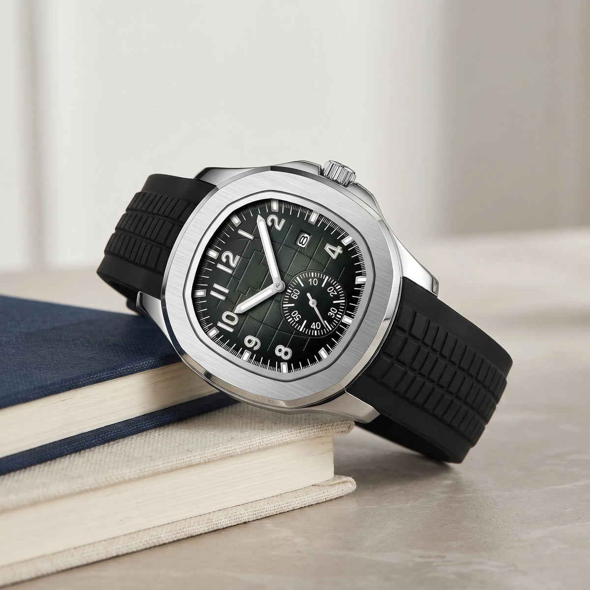Black strap sport watch on a stack of books