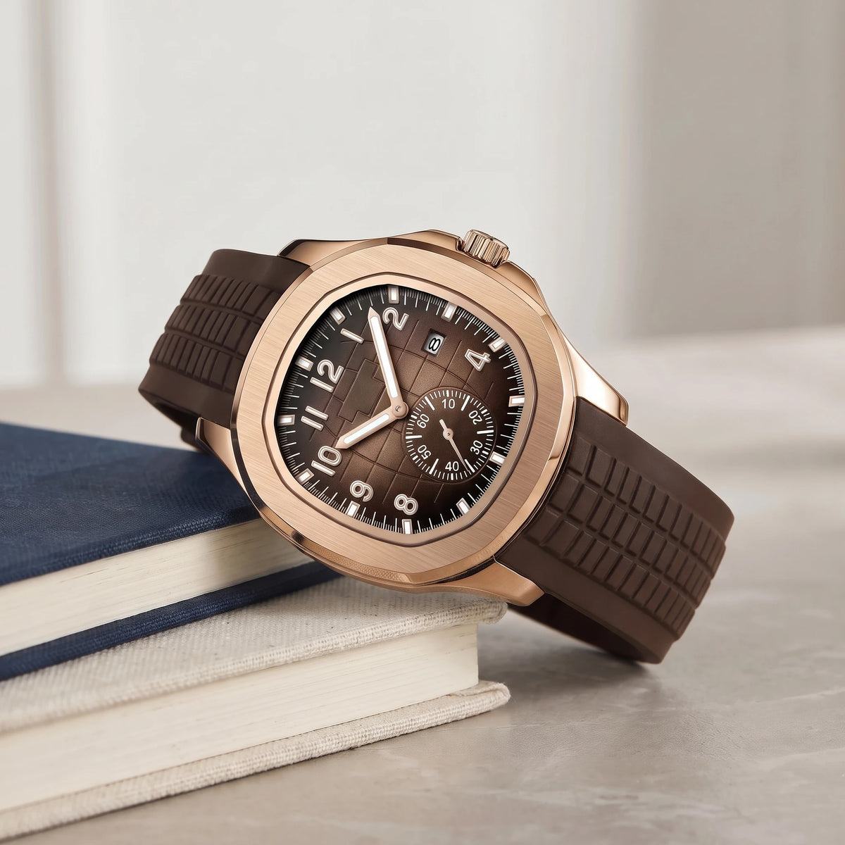 Brown strap sport watch on a stack of books
