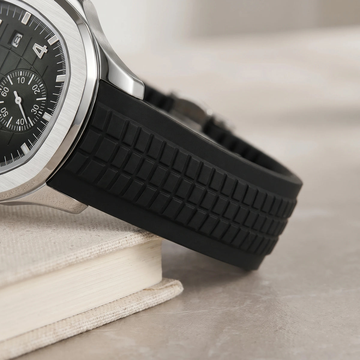 Close-up of the ribbed strap and silver case