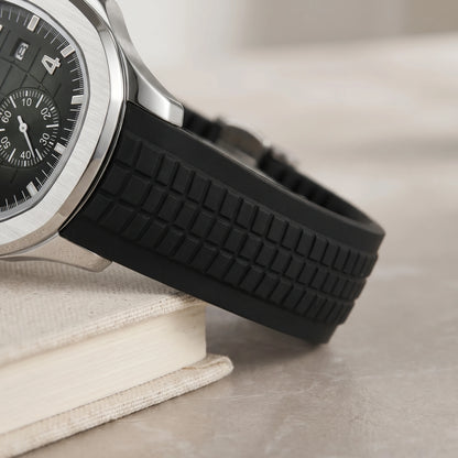 Close-up of the ribbed strap and silver case