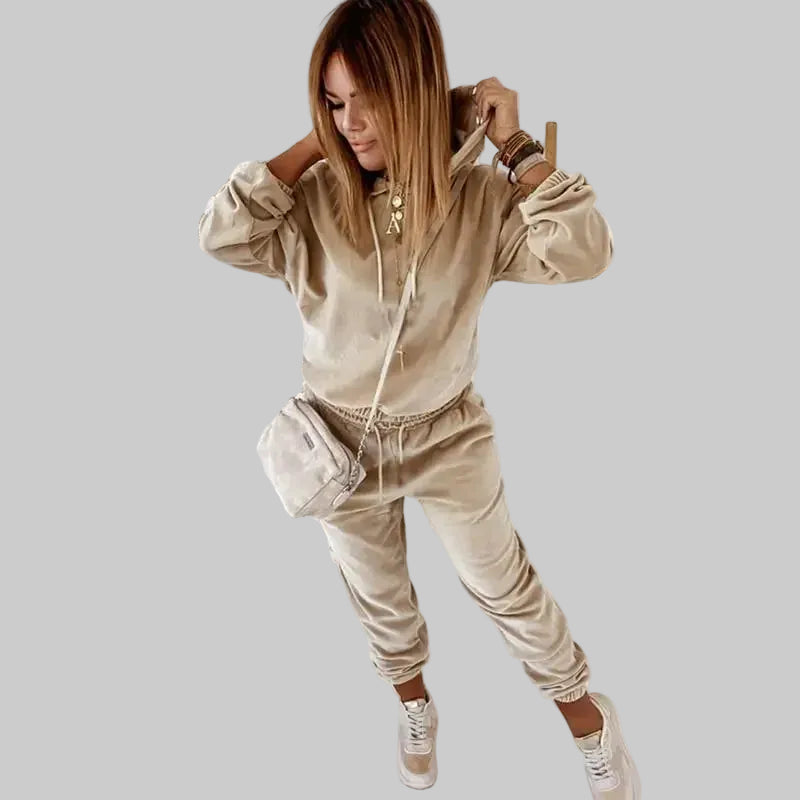Woman wearing a beige tracksuit 
